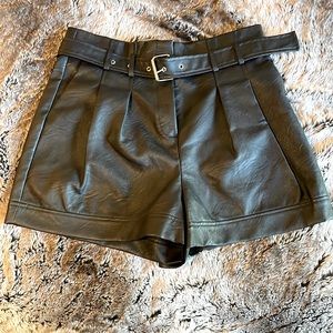 Size 12 black faux leather Topshop shorts.